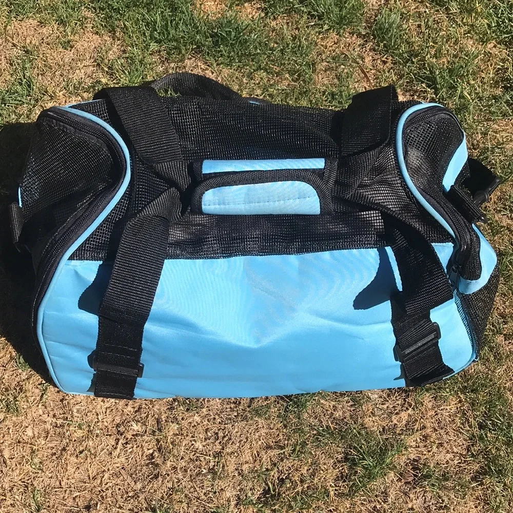 - Pet Carrier with shoulder strap light blue and black well vented used 1x